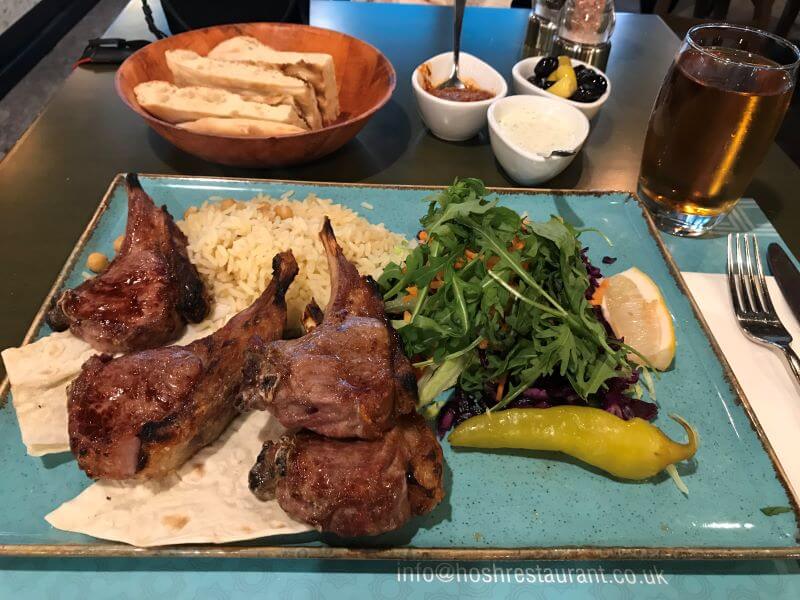 Lamb chops and apple juice at HOSH Restaurant