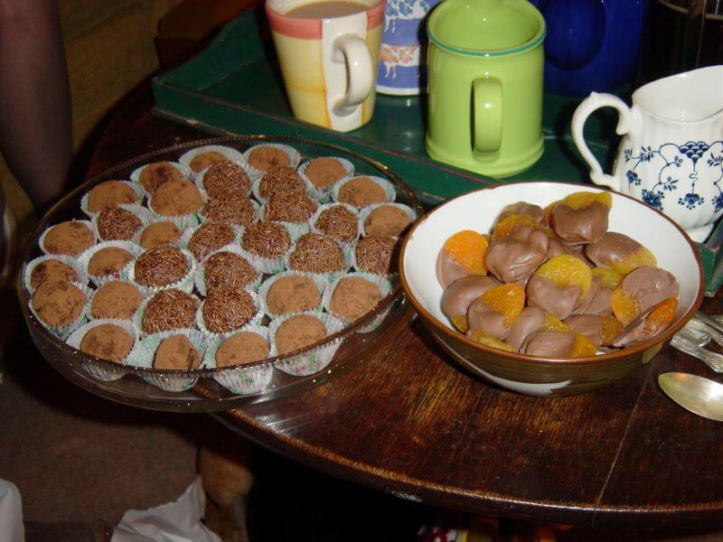 chocolate truffles and apricots covered with chocolate