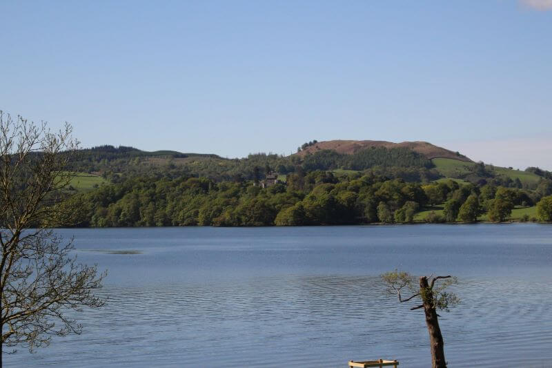 The view of Wray Castle from the opposite shore of Windermere