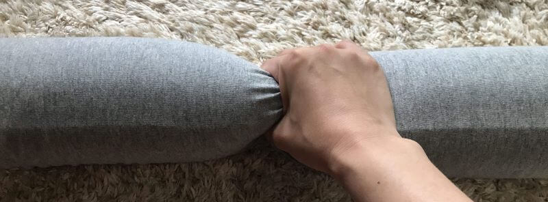 clasping a neck pillow
