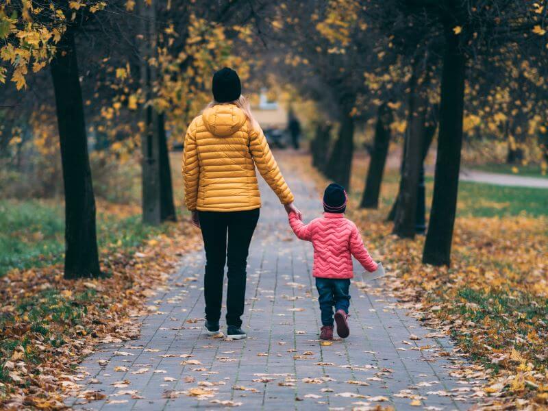 mum and child walking on the street