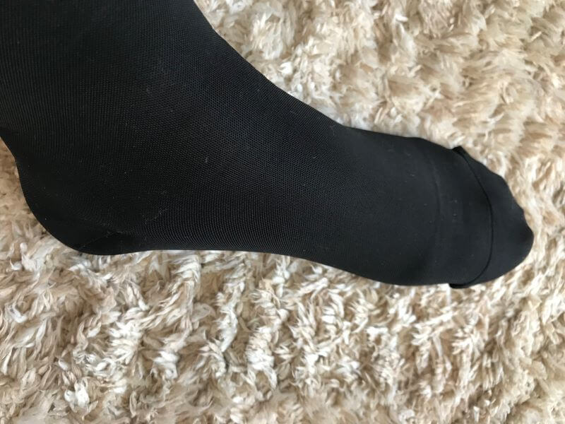 foot wearing pressure socks
